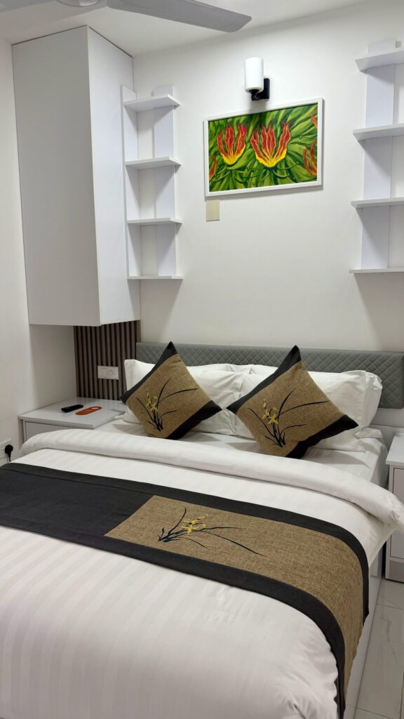 Lit double de la chambre du Lemonrock Comfort à Malé